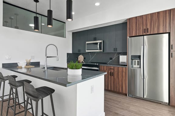 Model kitchen at Post House South located in Post District Residences in downtown Salt Lake City, Utah