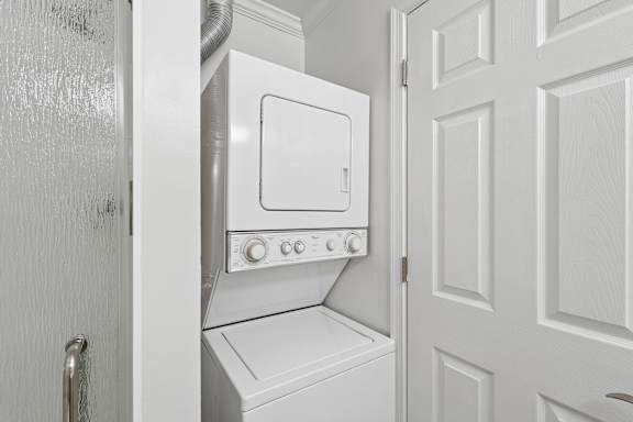 A white oven and stove in a kitchen.