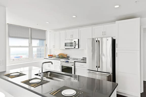 Kitchen with White Cabinets at 65 Bay Street Apartments in Downtown Jersey City, NJ