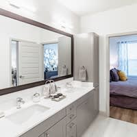Bathroom with a Vanity at Alys Crossing Apartments, Cypress, TX