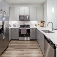 Kitchen with Stainless Steel Appliances at Alys Crossing Apartments, Cypress