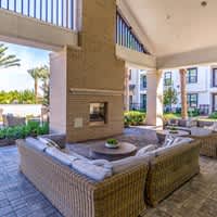 Patio with a Couch at Alys Crossing Apartments, Texas, 77433