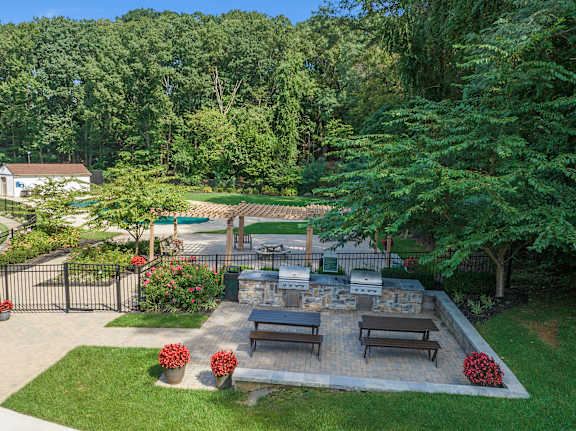 Backyard with fire pit at Atlantic Pointe Apartments, New Jersey
