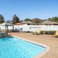 Swimming Pool in Backyard at Arbors at Natchez Trace Apartments, Ridgeland, Mississippi