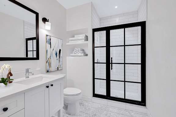Bathroom with a toilet at The Glover House Apartments, District of Columbia