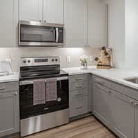 Kitchen with Dishwasher at Alys Crossing Apartments, Cypress, TX, 77433