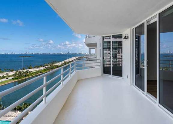 a balcony with a view of a body of water at The Hamilton, Miami, 33137
