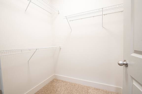 White Closet with Empty Shelves at Midtown Row Apartments, Alabama, 36106