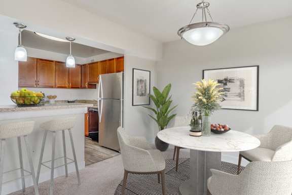A modern kitchen with a dining table  at Seminary Towers, Alexandria, VA, 22304