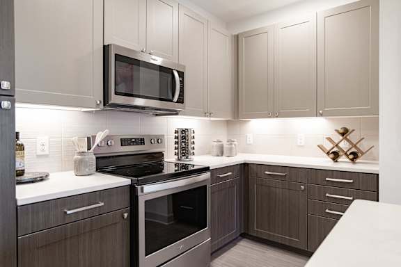 Kitchen with Microwave at The Rosemary Apartments, Humble, 77346