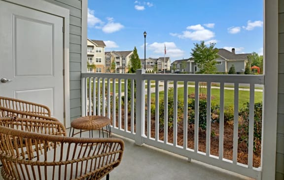 Outdoor Patio with two chairs at Ascent at Mallard Creek Apartment Homes, Charlotte, 28262