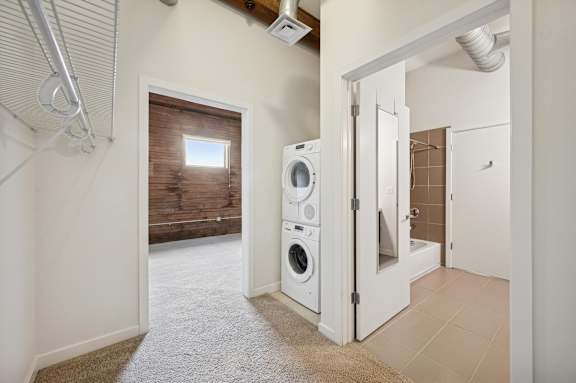 A laundry room with a washer and dryer.