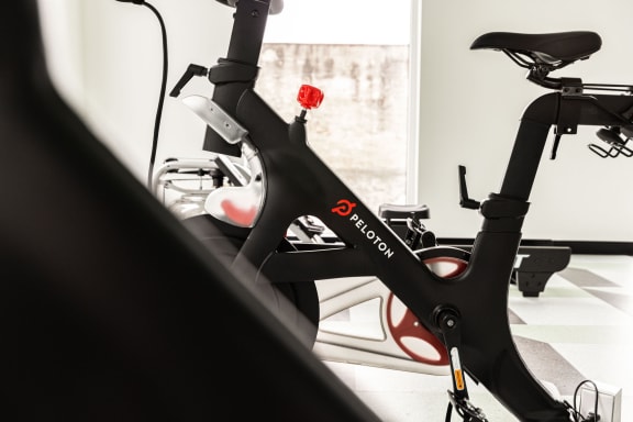 a bike in a room with a window