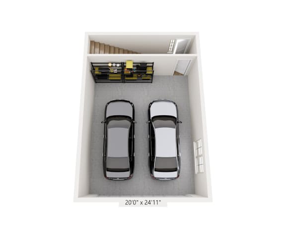 the interior of a parking garage with two cars in it