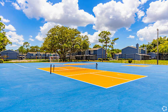 the tennis court at the estates apartments
