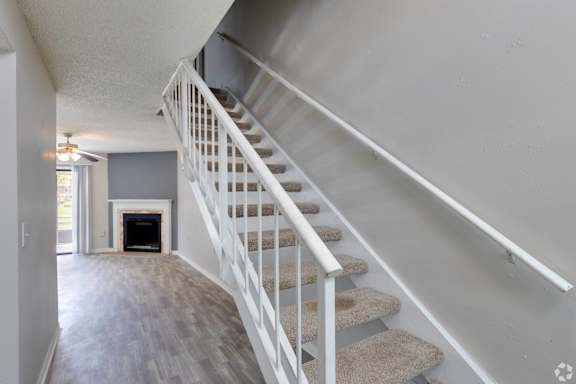 the stairway up to the second floor of a house
