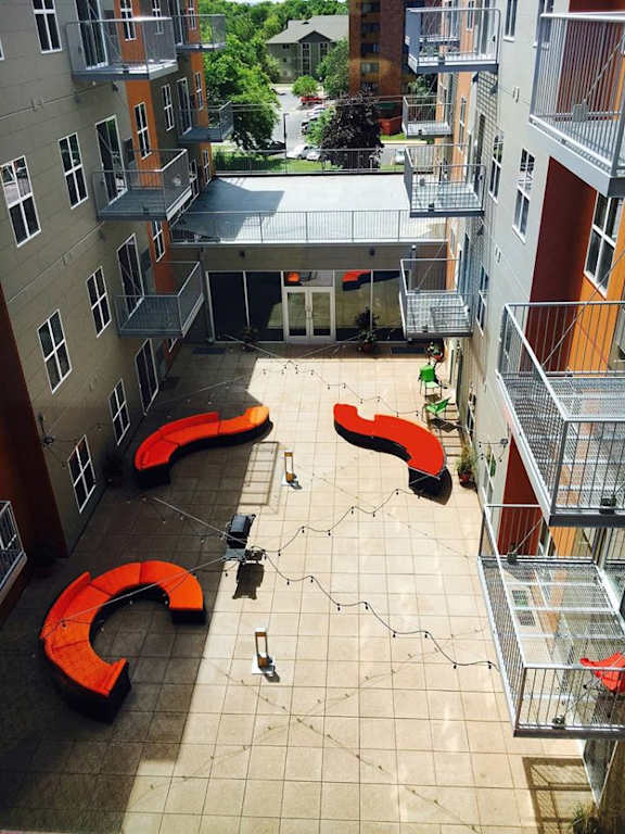 an aerial view of the courtyard of a building