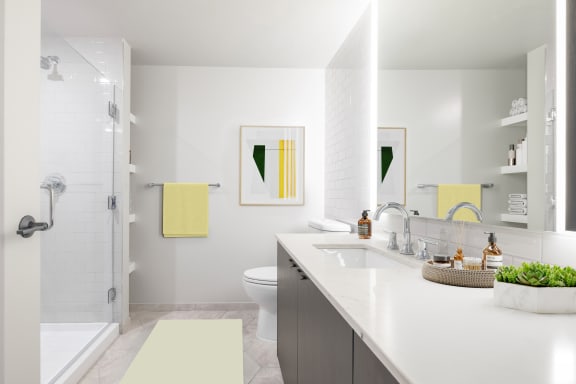 a bathroom with white walls and white countertops