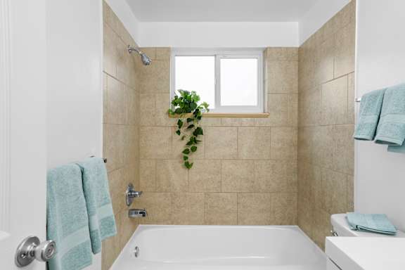 Towels in a bathroom at Kingsbrook Arms, Englewood Colorado