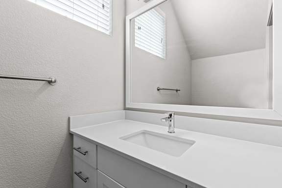 Modern Bathroom with Framed Mirror at The Point at Biscay, Aurora, CO