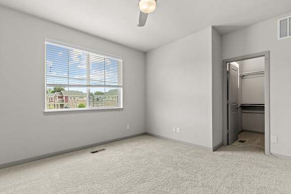 Carpeted Bedroom with Plenty Of Natural Lights at The Point at Biscay, Colorado