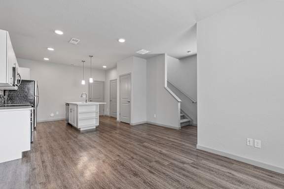 Living Room Come Kitchen View at The Point at Biscay, Aurora, 80013