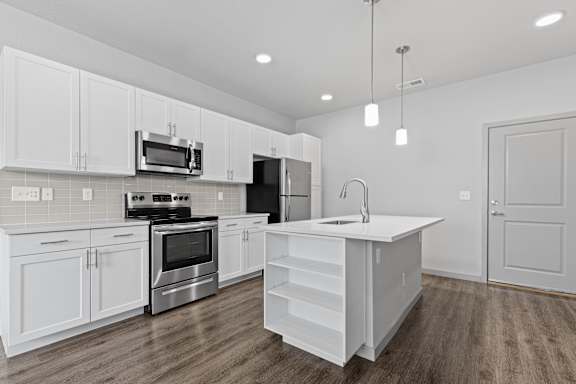 Fully Equipped Kitchen With Modern Appliances at The Point at Biscay, Colorado