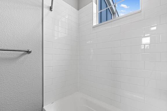 Bathroom With Bathtub at The Point at Biscay, Aurora, Colorado
