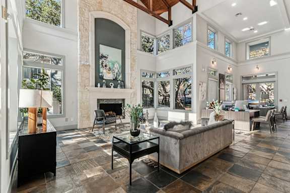 A living room with a fireplace and a couch.