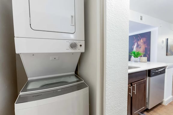 A white dryer is on the left and a white washer is on the right.