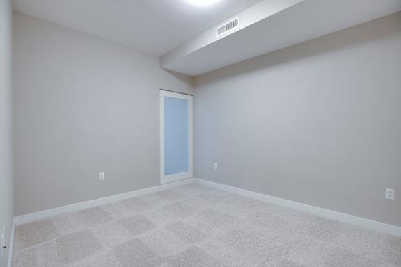 Carpeted bedroom in Valo Apartments in Southwest Waterfront in Washington DC 20024