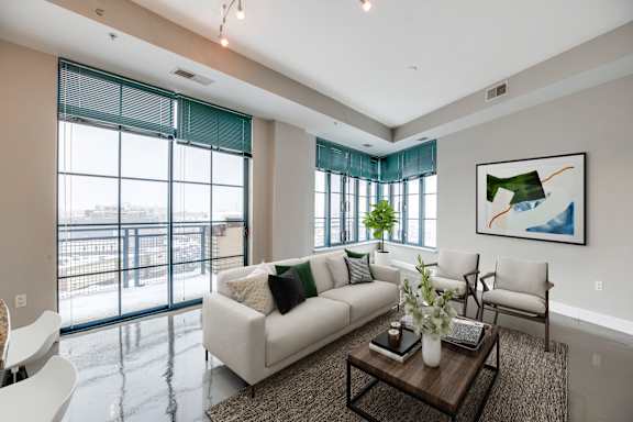 Living room with 10-foot ceilings with city views at Park Place at Petworth Station in Washington, DC 20011