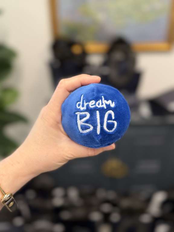 a blue and white logo with the words bmg coffee