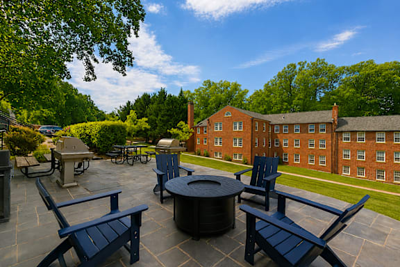 Park Crest Apartments Terrace with Fire Pit and Lounge Chairs