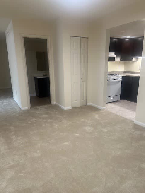 A room with a washer and dryer in it.
