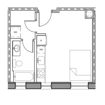 A floor plan of a room with a kitchen area and a bathroom.