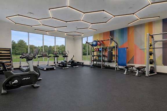 Fitness center with strength equipment at Prosper West Apartments, Waite Park, MN 56387