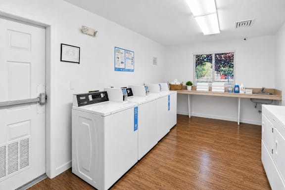 A laundry room with a washer and dryer.