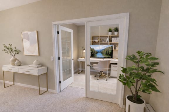 A room with a white door leading to a balcony with a table and chairs.