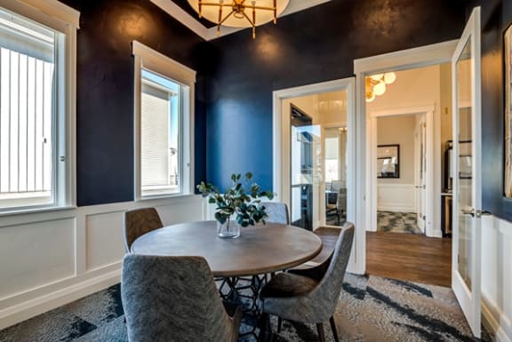 Clubhouse with navy blue walls and white trim at Connect at First Creek, Denver, CO