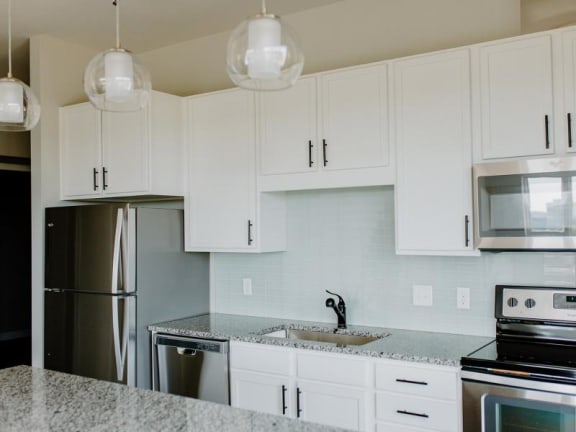 Fully Equipped Kitchen With Modern Appliances at Hello Apartments, Minneapolis, Minnesota