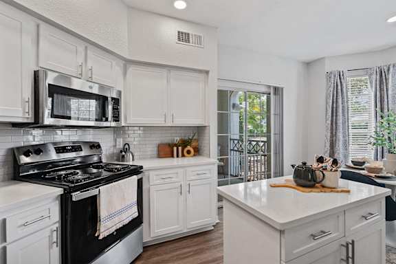 Kitchen with island and stove