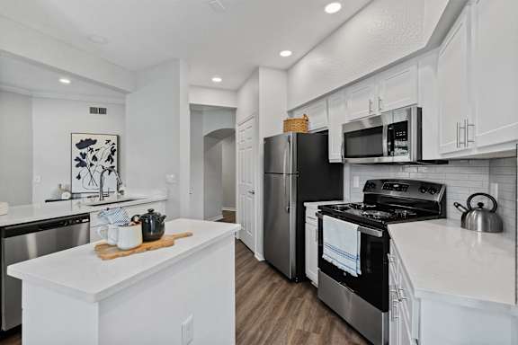 kitchen with stove and refrigerator