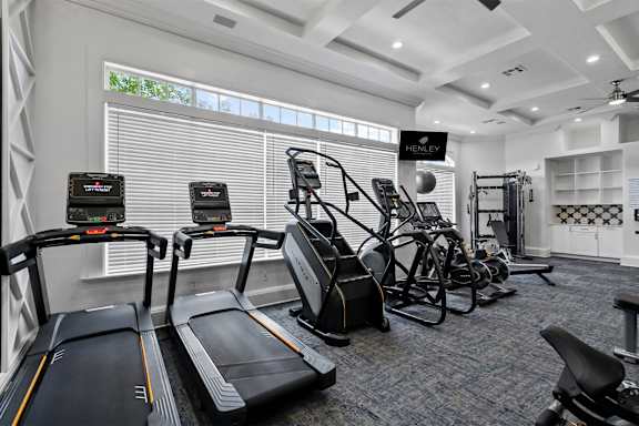 fitness center with cardio equipment