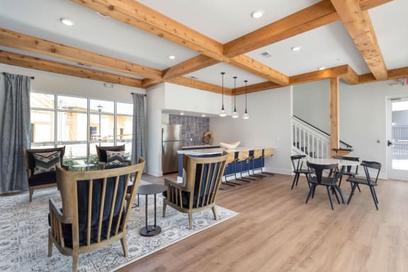 a dining room and living room with a table and chairs at Bristol at New Riverside, South Carolina, 29910