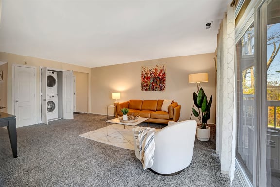 Living Room and Full Size Washer and Dryer at Kenilworth at Charles Apartments, Towson, Maryland