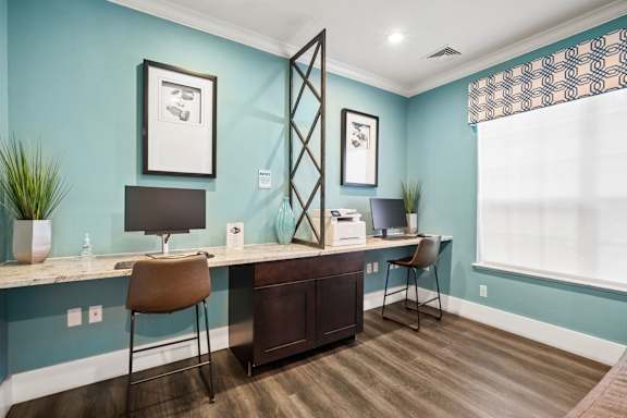 counter with computers and stools