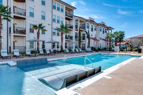 In water tanning ledge at Two Addison Place Apartments , Pooler, 31322