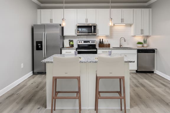 Kitchen with stainless appliances at The Reserve at Mayfaire Apartments, Wilmington NC