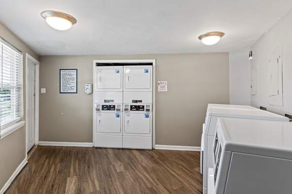 A laundry room with a washer and dryer.